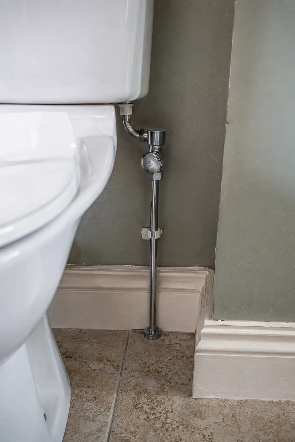 Plumber completing SEAI-approved insulation and heating work in an Irish home